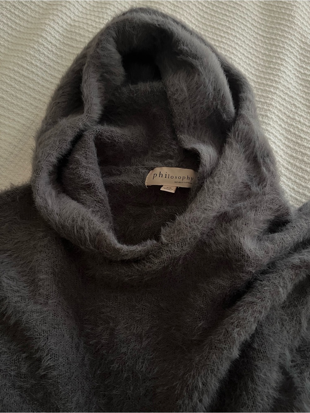 Fuzzy hooded sweater. Size XS.